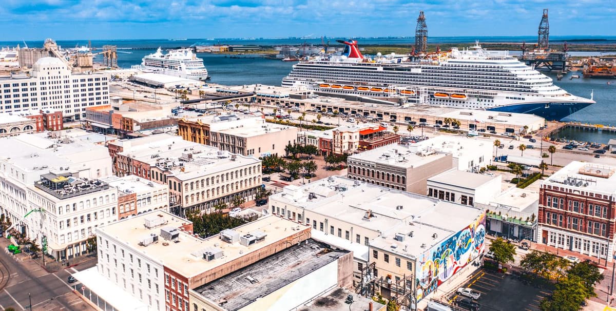 Aerial view of Galveston Strand facing cruise port looking at two cruise ships
